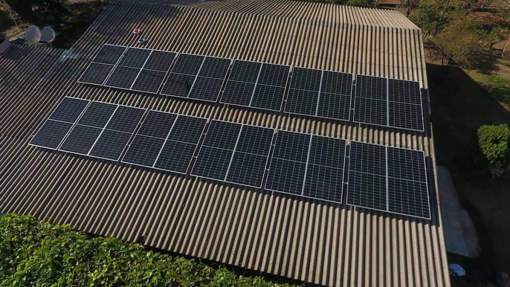 Solar panels installed across a commercial rooftop