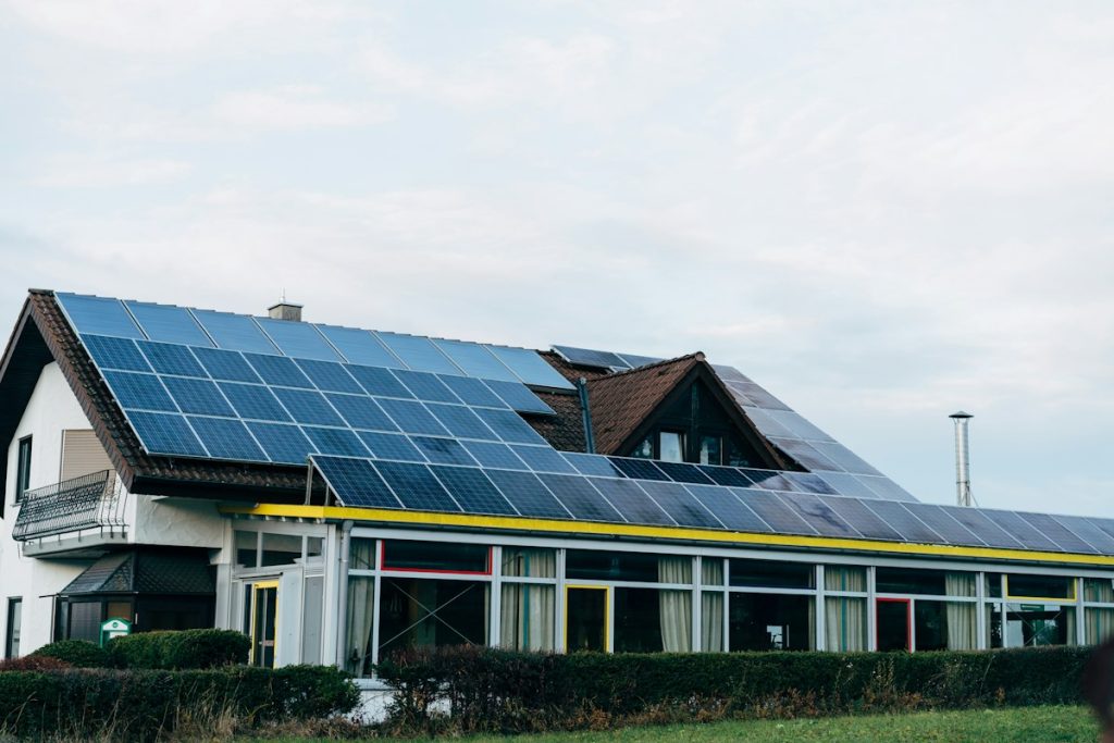 House with a full solar panel installation across its roof